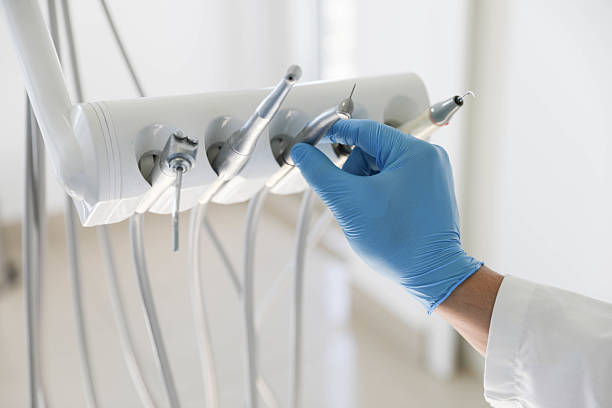 Professional Emergency Dentist technician working in Mulberry, AR
